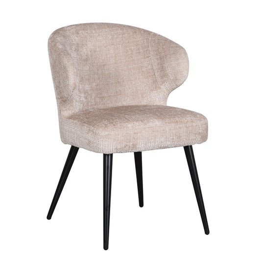 Set van twee crèmekleurige Pole To Pole Mera eetkamerstoelen met slanke poten, gefotografeerd in een modern interieur.